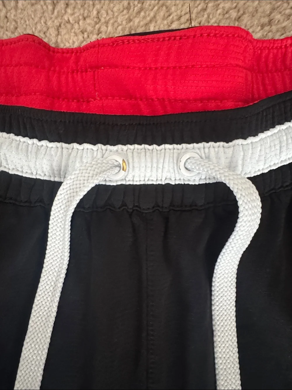 Nike Black Athletic Shorts with Red Inner Liner and White Trim